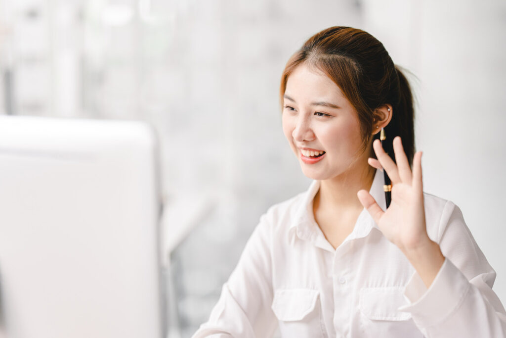 Portrait of an asian woman having a video conference